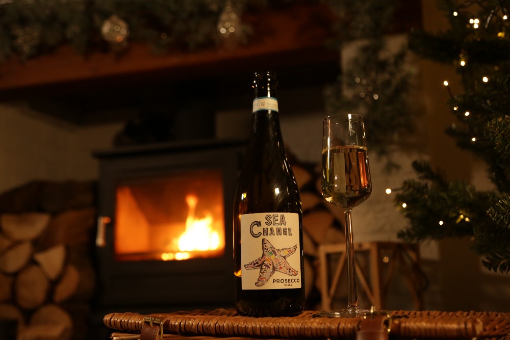 Enjoy a prosecco by the fire