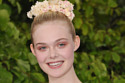 Elle added some beautiful flowers to adorn her simple hairstyle