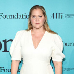 Amy Schumer flashed her boob at the late Jimmy Buffett’s widow during a dinner to honour the crooner