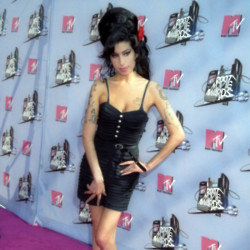 Amy Winehouse's dad Mitch is suing two of her friends