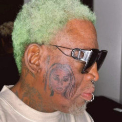 Dennis Rodman gets a tattoo of his wife's face