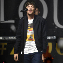 Louis Tomlinson is the proud owner of the Artist of the Year prize