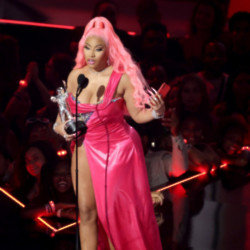 Nicki Minaj declared she is on a break still as she revives her Chun-Li alter-ego