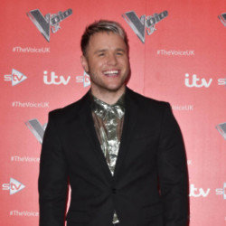 Olly Murs has gushed over his wife after their emotional wedding