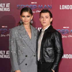 Tom Holland and Zendaya at a photocall for Spider-Man: No Way Home