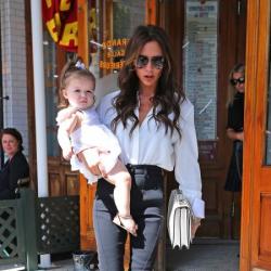 Victoria Beckham looks chic whilst shopping with Harper