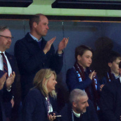William, Prince of Wales and Prince George went to a football match