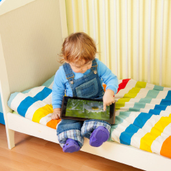 Child playing on a tablet
