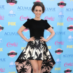 Lily Collins looks beautiful in her bold skirt