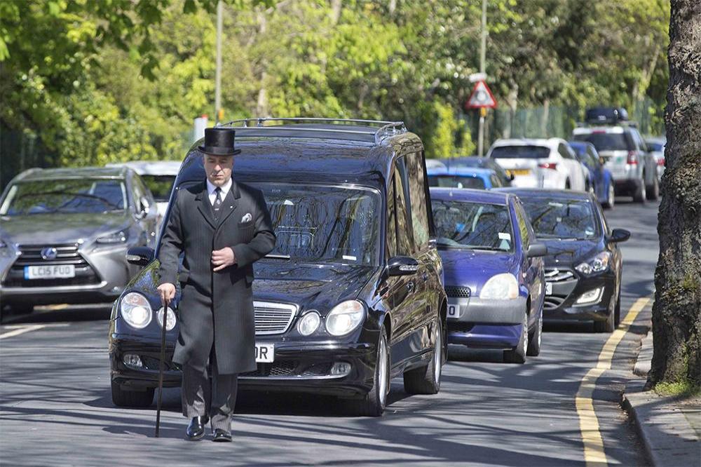David Gest's hearse arrives at the funeral