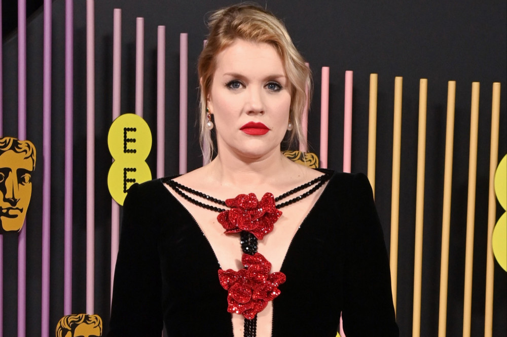 Emerald Fennell declared she was up for dancing naked during the BAFTAs – if she could get her frock off