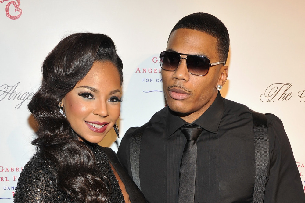 Nelly and Ashanti are really back together after a decade apart