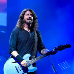 Dave Grohl's band Foo Fighters teamed up with Alanis Morissette on stage at Japan's Fuji Rock Festival