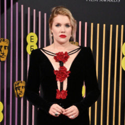 Emerald Fennell declared she was up for dancing naked during the BAFTAs – if she could get her frock off