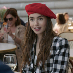 Lily Collins as her character Emily Cooper in Emily In Paris
