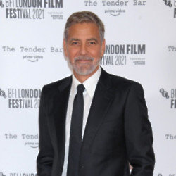 George Clooney calls up Santa Claus to discipline his children