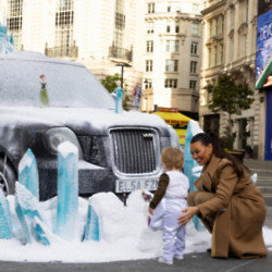 Jess Wright with son Presley checking out Frozen display in London