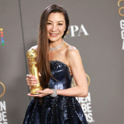 Michelle Yeoh refused to be played off stage at the Golden Globes