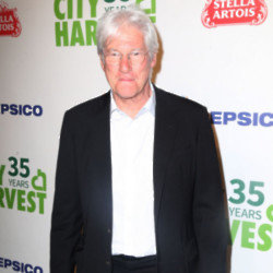 Richard Gere is reportedly on track for a victory with his controversial plan to erect a cell phone tower on his luxury inn