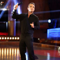 Robbie Williams is recording a new greatest hits collection