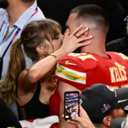 Taylor Swift kisses Travis Kelce after the Super Bowl